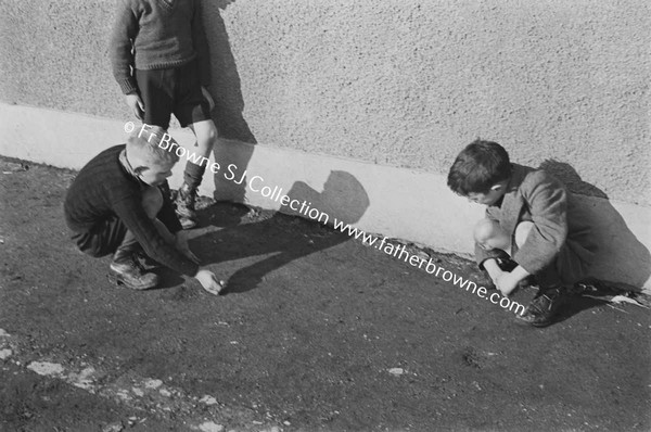 CHILDREN PLAYING IN STREET